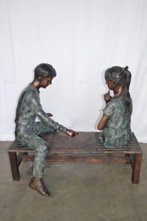 Young Couple Reviewing a World Map Bronze Statue -  Size: 32"L x 47"W x 42"H. - Image 9