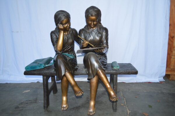 Two Schoolgirls Sitting On a Bench Bronze Statue -  Size: 45"L x 24"W x 41"H. - Image 3
