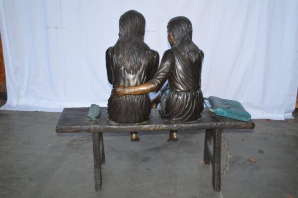 Two Schoolgirls Sitting On a Bench Bronze Statue -  Size: 45"L x 24"W x 41"H. - Image 9