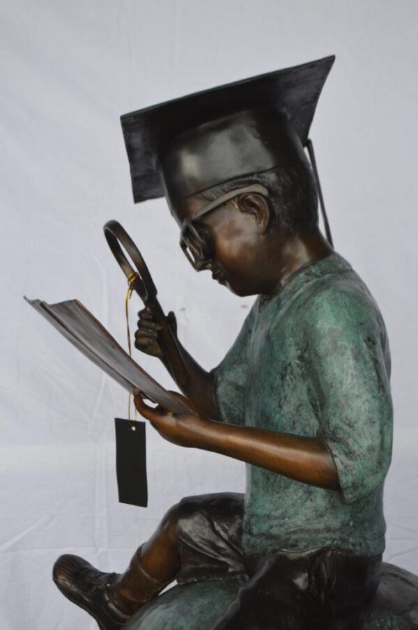 Student learning on top of world bronze statue -  Size: 28"L x 24"W x 52"H. - Image 8