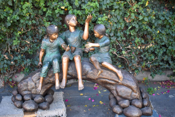 Three Kids Playing With Butterflies Bronze Statue -  Size: 70"L x 25"W x 45"H. - Image 3