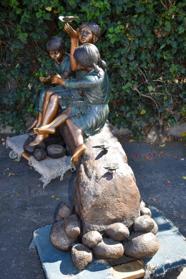 Three Kids Playing With Butterflies Bronze Statue -  Size: 70"L x 25"W x 45"H. - Image 7