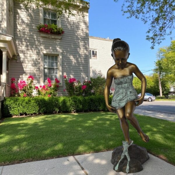 Girl looking at a frog bronze statue -  Size: 16"L x 13"W x 36"H. - Image 2