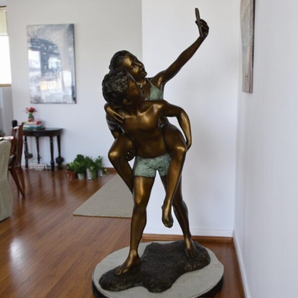 Kids Taking a Selfie W a Smartphone Bronze Statue -  Size: 23"L x 20"W x 43"H. - Image 2