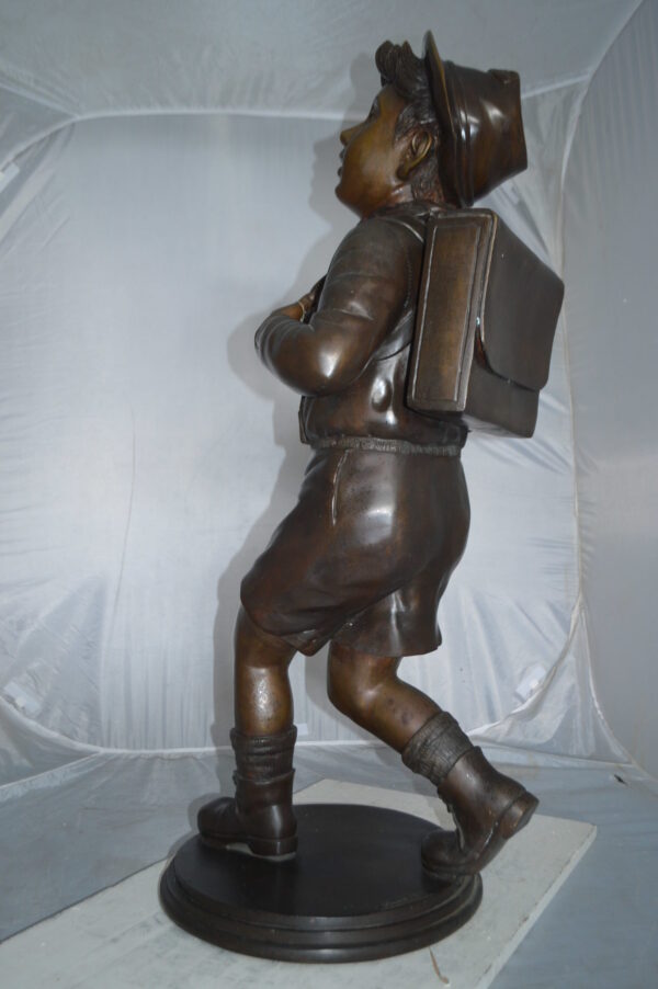 Boy with backpack bronze statue -  Size: 20"L x 18"W x 46"H. - Image 8