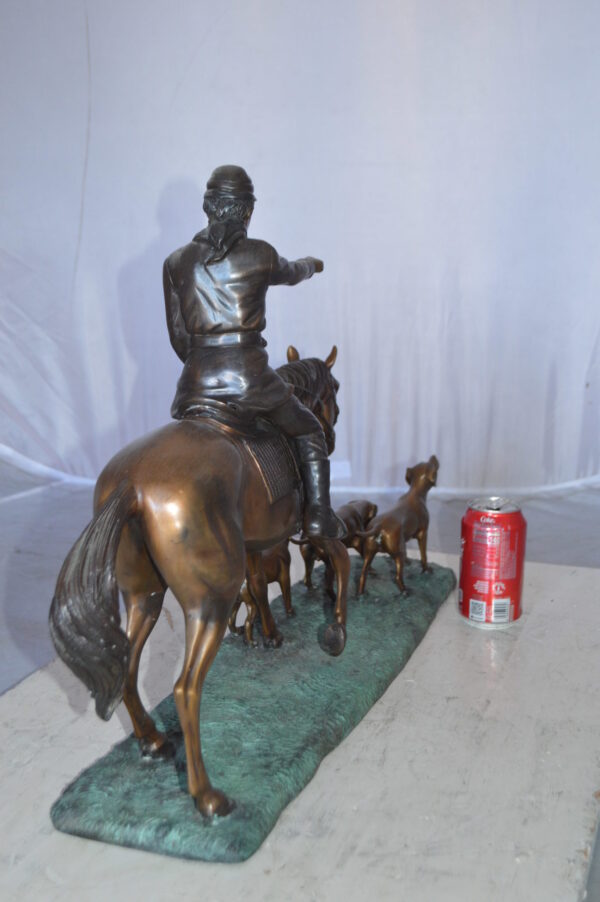 Hunter with three dogs Bronze Statue -  Size: 27"L x 6"W x 18"H. - Image 5