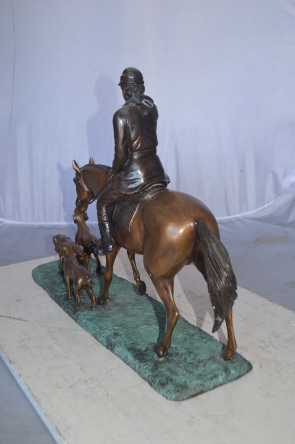 Hunter with three dogs Bronze Statue -  Size: 27"L x 6"W x 18"H. - Image 6