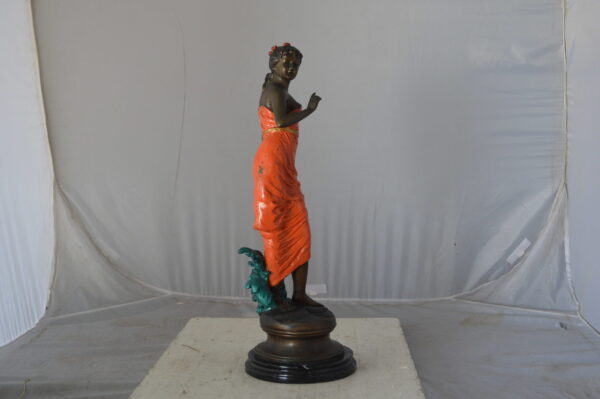 Young lady in orange bronze statue - Size: 7"L x 26"W x 25"H. - Image 11