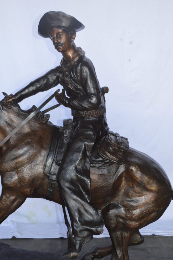 Giant Cowboy Remington bronze statue - Size: 66"L x 30"W x 58"H. - Image 3