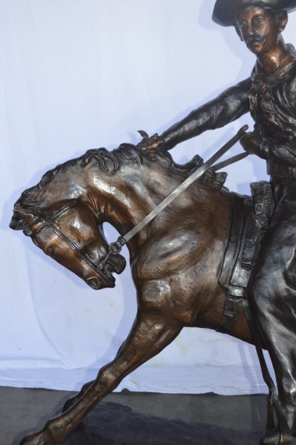 Giant Cowboy Remington bronze statue - Size: 66"L x 30"W x 58"H. - Image 4