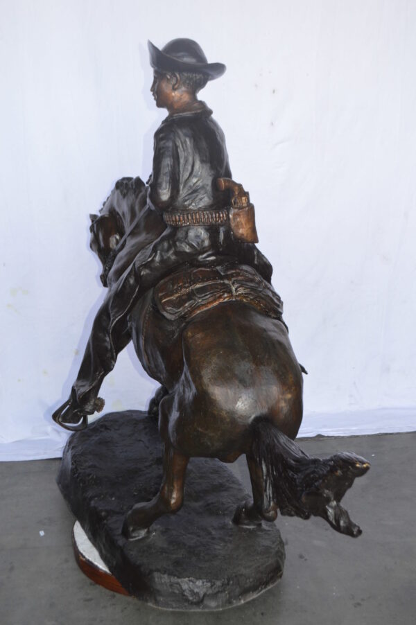 Giant Cowboy Remington bronze statue - Size: 66"L x 30"W x 58"H. - Image 6