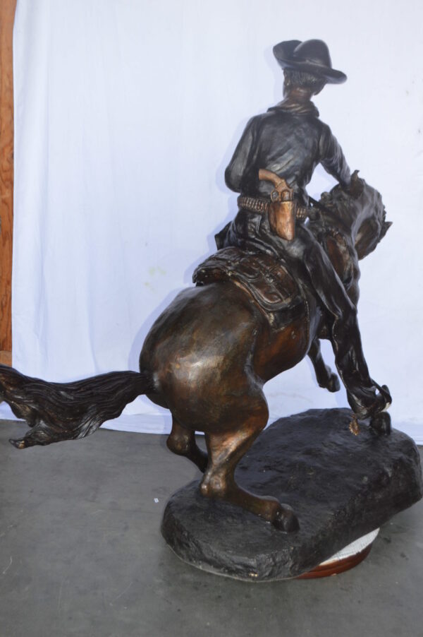 Giant Cowboy Remington bronze statue - Size: 66"L x 30"W x 58"H. - Image 7