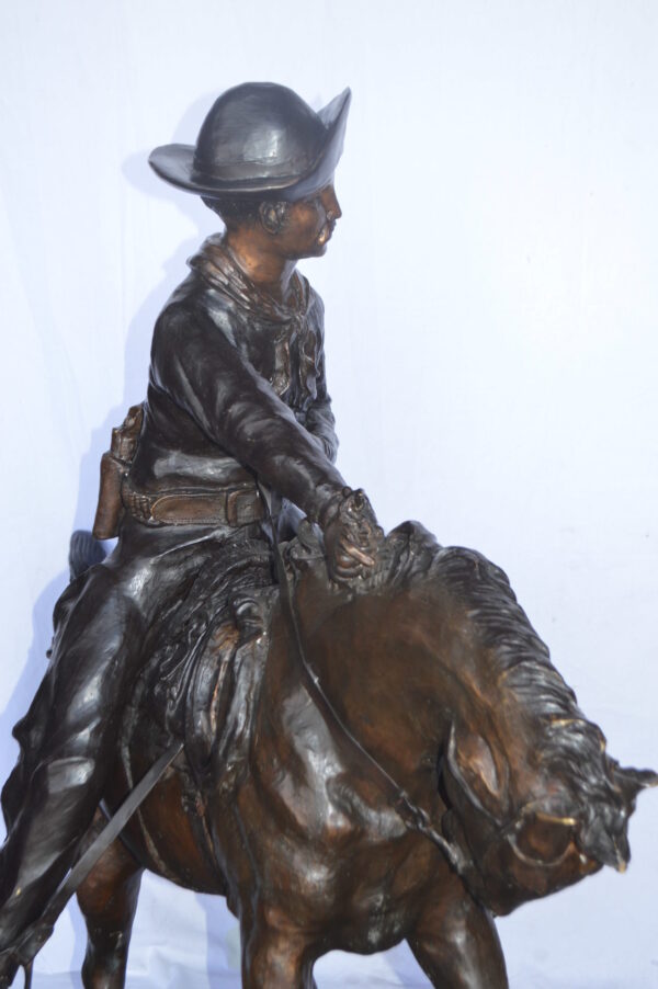 Giant Cowboy Remington bronze statue - Size: 66"L x 30"W x 58"H. - Image 10