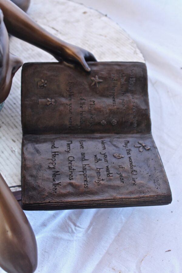 Peaceful young girl enjoying a read bronze statue -  Size: 40"L x 17"W x 13"H. - Image 10