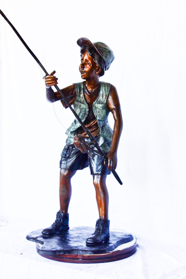 A young boy and his fishing journey bronze statue -  Size: 24"L x 26"W x 47"H. - Image 7