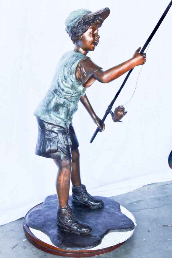 A young boy and his fishing journey bronze statue -  Size: 24"L x 26"W x 47"H. - Image 12