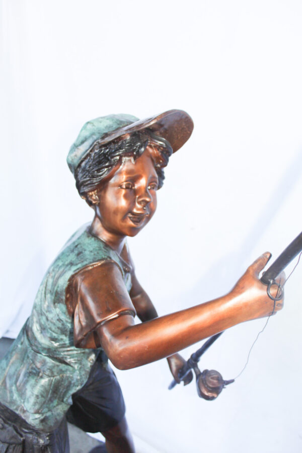A young boy and his fishing journey bronze statue -  Size: 24"L x 26"W x 47"H. - Image 14