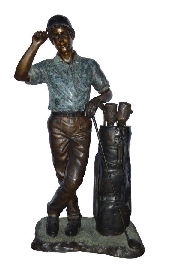 Golfer standing with his gear large bronze Statue - Size: 34"L x 21"W x 65"H.