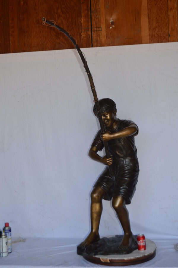A Young Boy Fishing Bronze Statue - Size: 16"L x 54"W x 62"H. - Image 5