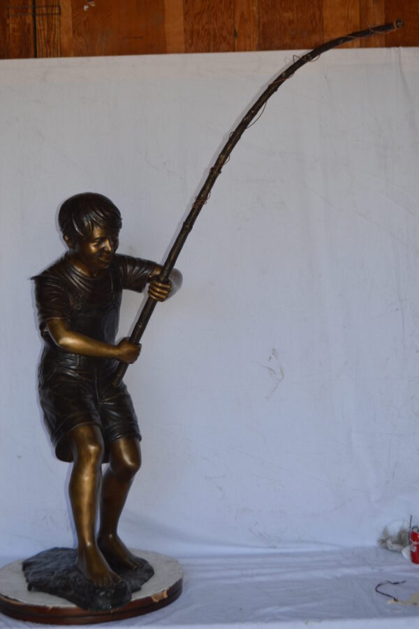 A Young Boy Fishing Bronze Statue - Size: 16"L x 54"W x 62"H. - Image 8
