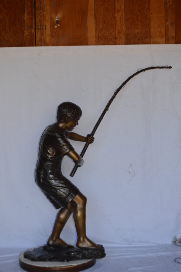 A Young Boy Fishing Bronze Statue - Size: 16"L x 54"W x 62"H. - Image 10