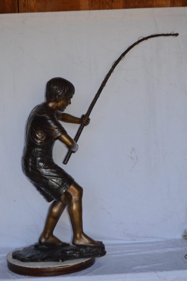 A Young Boy Fishing Bronze Statue - Size: 16"L x 54"W x 62"H. - Image 11