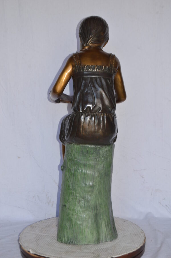 Girl Sitting on a Tree Stump, Reading Bronze Statue - Size: 15"L x 20"W x 22"H. - Image 7