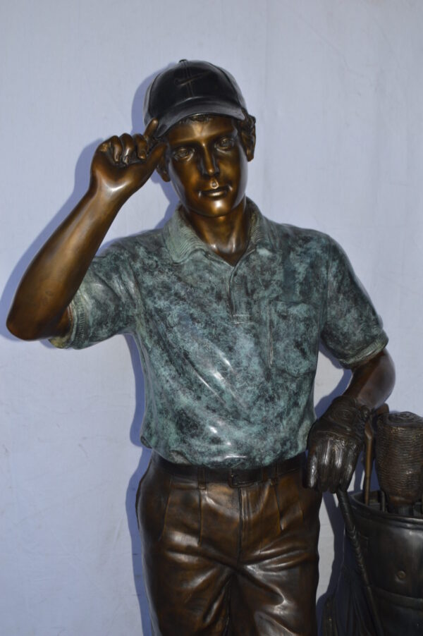 Golfer standing with his gear large bronze Statue - Size: 34"L x 21"W x 65"H. - Image 4