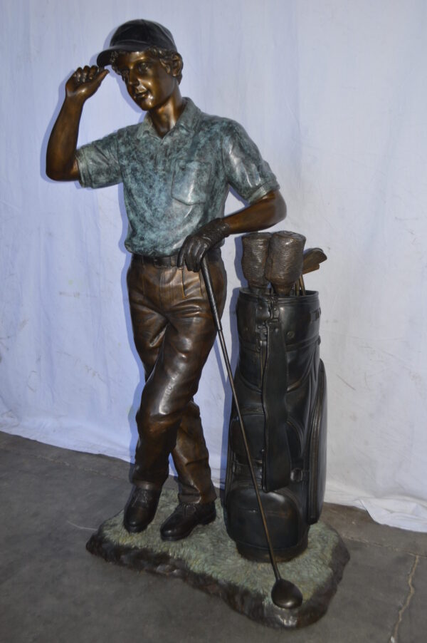 Golfer standing with his gear large bronze Statue - Size: 34"L x 21"W x 65"H. - Image 6