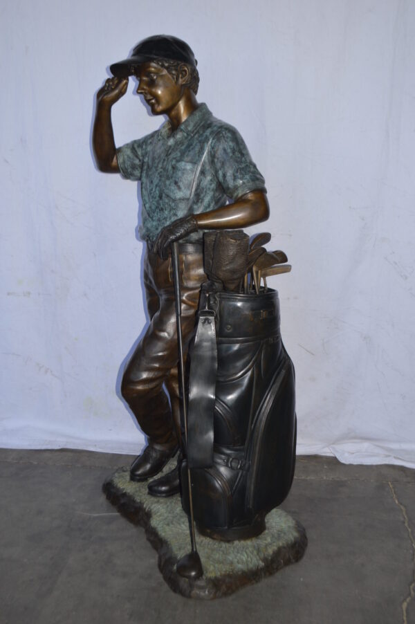 Golfer standing with his gear large bronze Statue - Size: 34"L x 21"W x 65"H. - Image 7