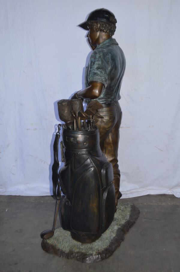 Golfer standing with his gear large bronze Statue - Size: 34"L x 21"W x 65"H. - Image 9
