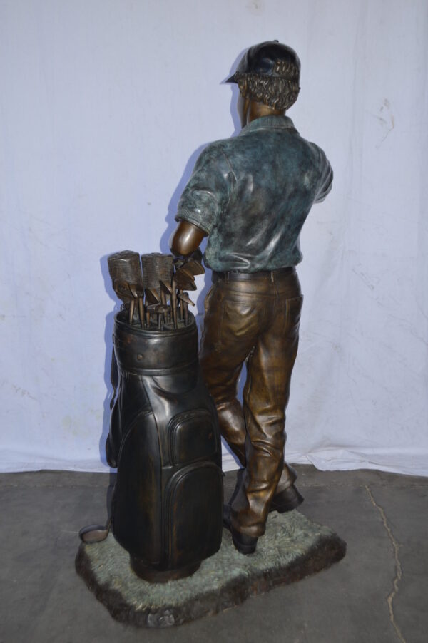 Golfer standing with his gear large bronze Statue - Size: 34"L x 21"W x 65"H. - Image 10