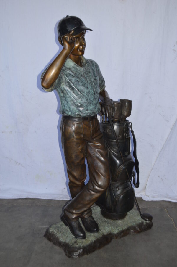 Golfer standing with his gear large bronze Statue - Size: 34"L x 21"W x 65"H. - Image 13