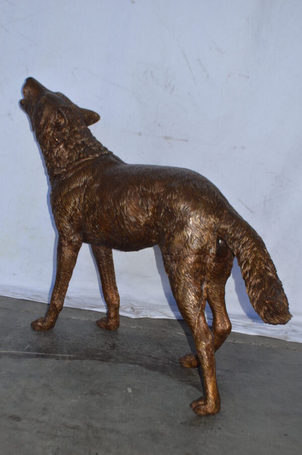 Wolf Standing and Howling Life Size Bronze Statue - Size: 45"L x 15"W x 34"H. - Image 7