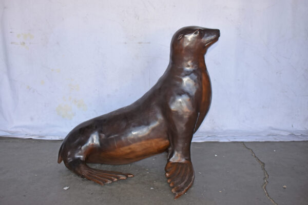 Perched Life Size Seal bronze statue - Size: 40"L x 35"W x 31"H. - Image 3