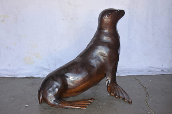 Perched Life Size Seal bronze statue - Size: 40"L x 35"W x 31"H. - Image 5
