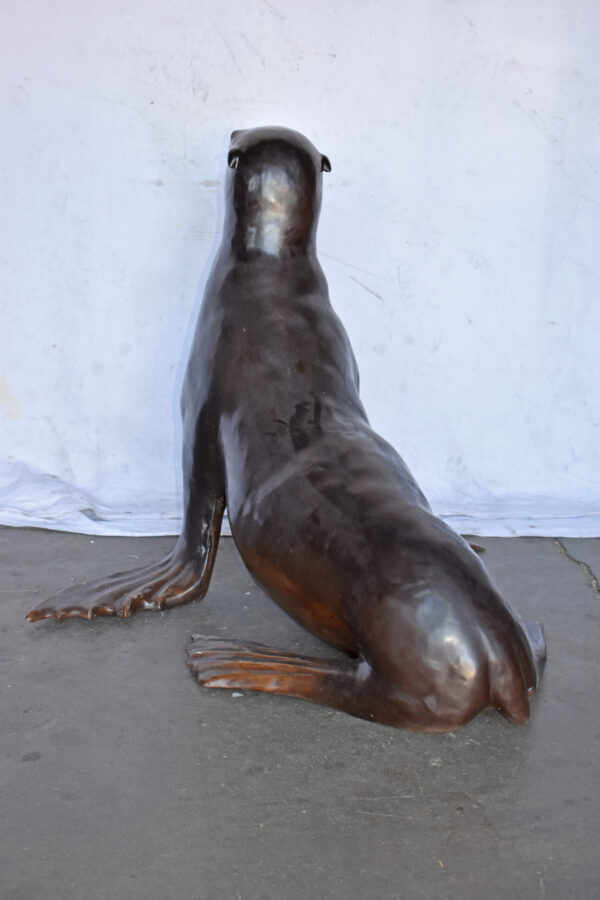 Perched Life Size Seal bronze statue - Size: 40"L x 35"W x 31"H. - Image 8