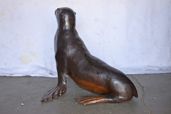 Perched Life Size Seal bronze statue - Size: 40"L x 35"W x 31"H. - Image 9