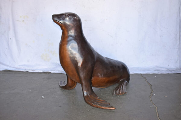 Perched Life Size Seal bronze statue - Size: 40"L x 35"W x 31"H. - Image 11