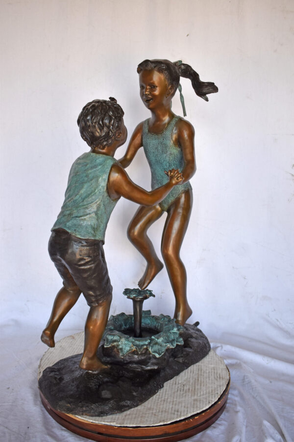 Young Boy and girl dancing around fountain bronze statue-Size 28" x 13" x 38"H - Image 5