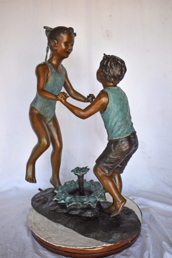 Young Boy and girl dancing around fountain bronze statue-Size 28" x 13" x 38"H - Image 8