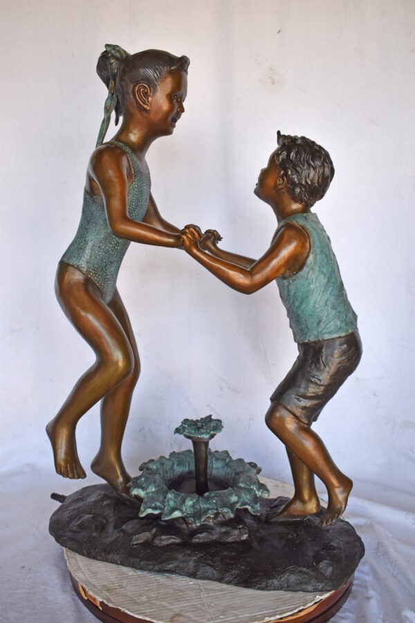Young Boy and girl dancing around fountain bronze statue-Size 28" x 13" x 38"H - Image 9