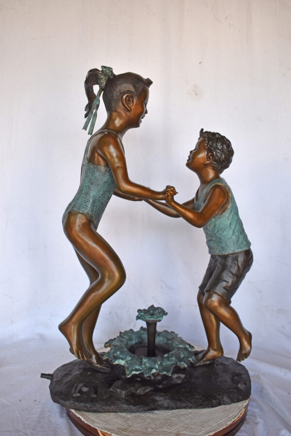 Young Boy and girl dancing around fountain bronze statue-Size 28" x 13" x 38"H - Image 10