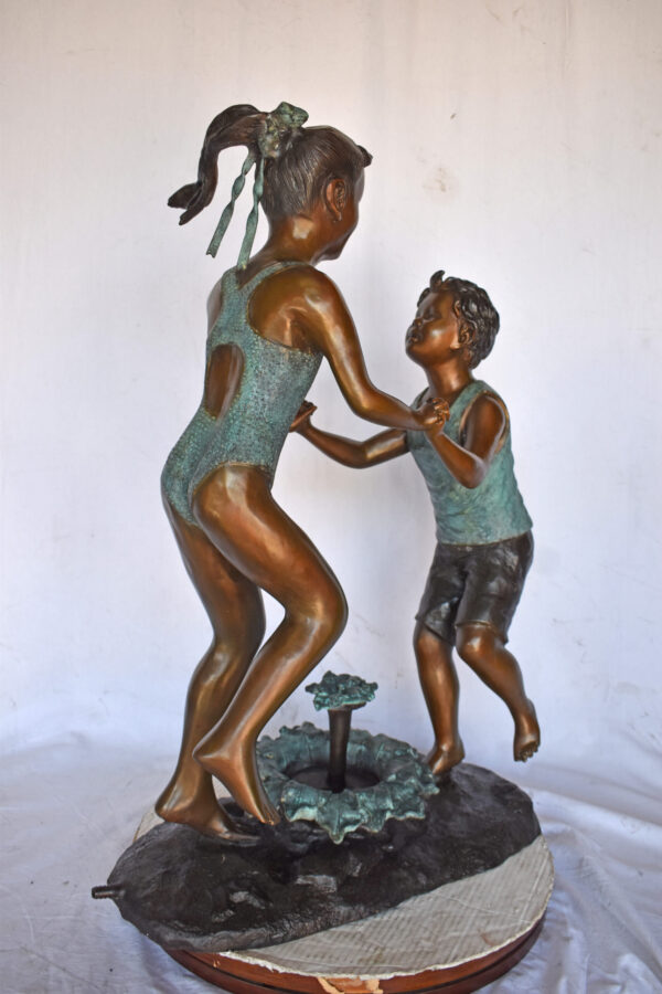 Young Boy and girl dancing around fountain bronze statue-Size 28" x 13" x 38"H - Image 11
