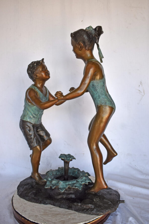 Young Boy and girl dancing around fountain bronze statue-Size 28" x 13" x 38"H - Image 13