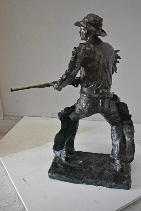 Cowboy with His Gun Bronze Statue - Size: 26"L x 13"W x 33"H. - Image 9