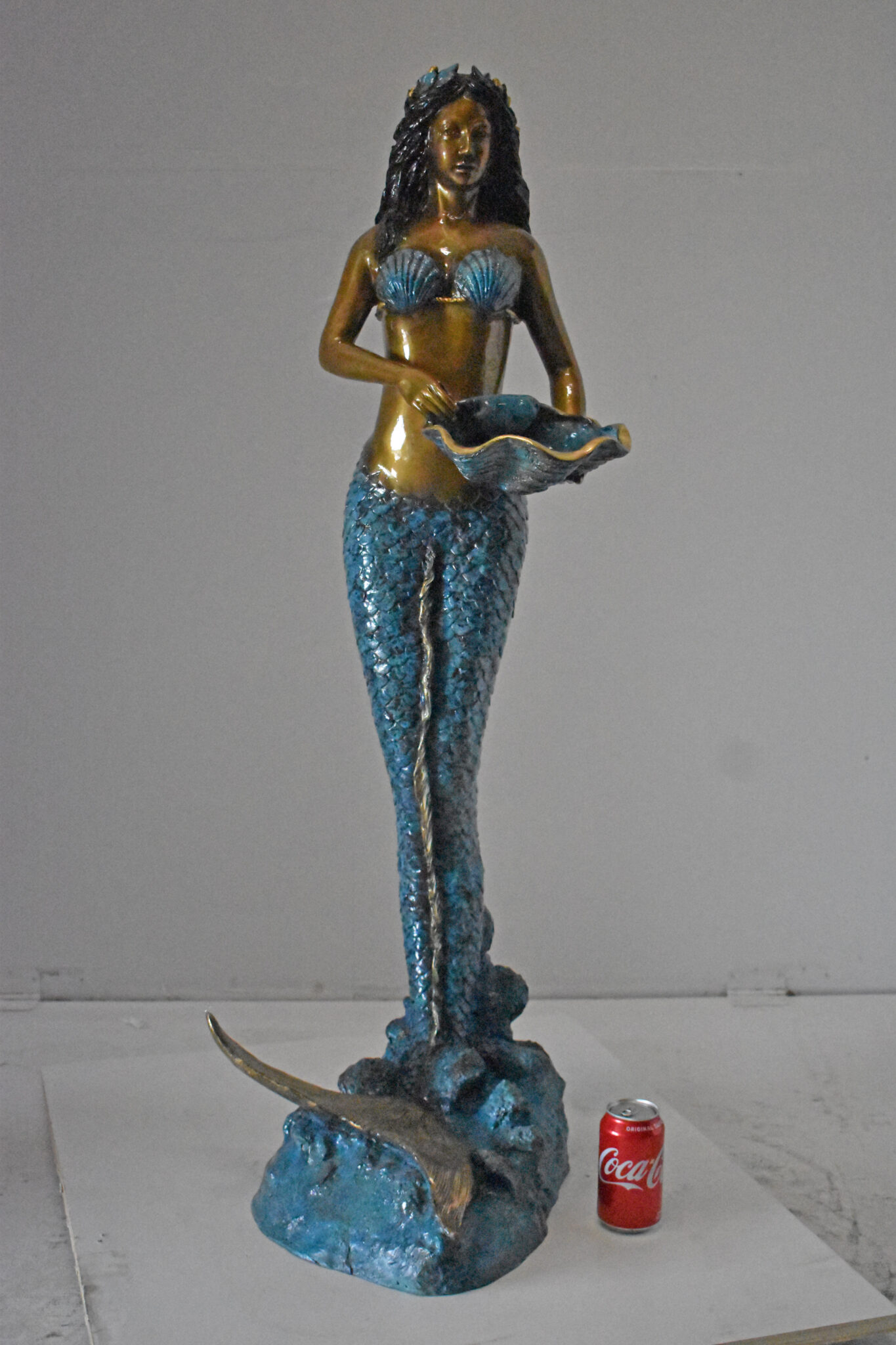 bronze mermaid figurine