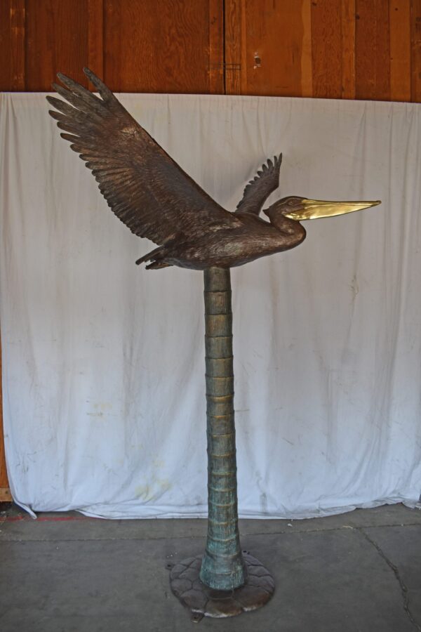Life Size Pelican on a Three Bronze Statue - Size: 55"L x 46"W x 60"H. - Image 4