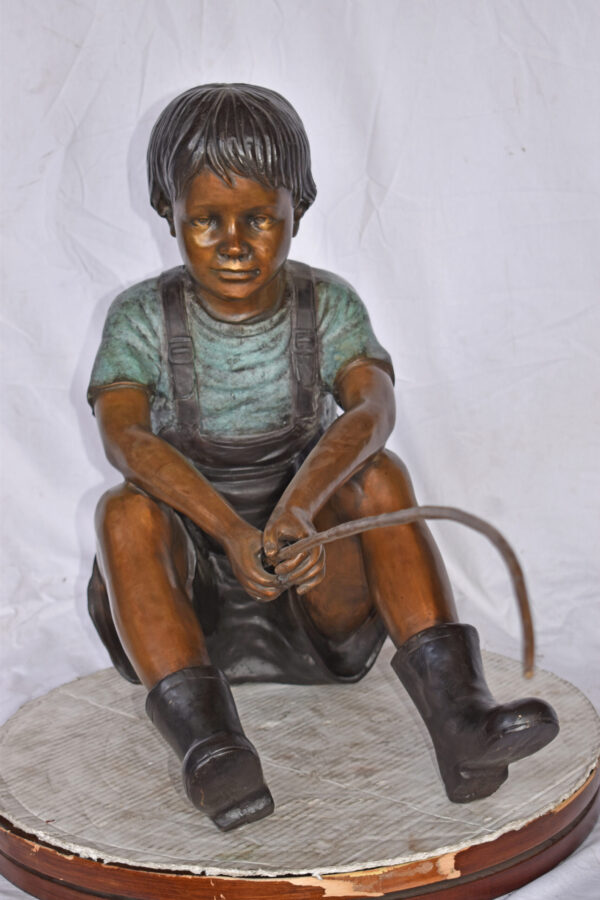 Boy Sitting on the Ground, Fishing Bronze Statue - Size: 26"L x 15"W x 25"H. - Image 6
