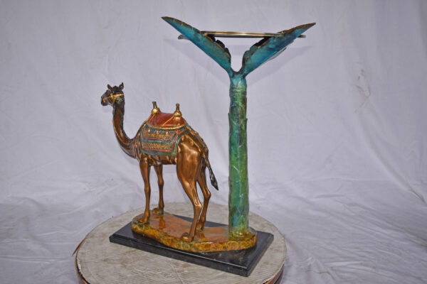 Camel Standing Under A Palm Tree Bronze Statue - Size: 20"L x 29"W x 25"H. - Image 3